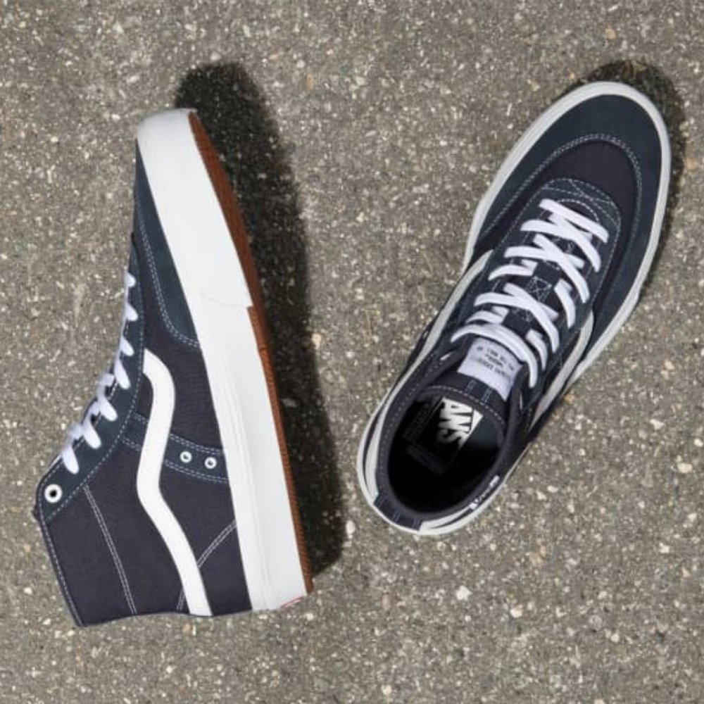 Vans Men's Black and White High-Top Sneakers